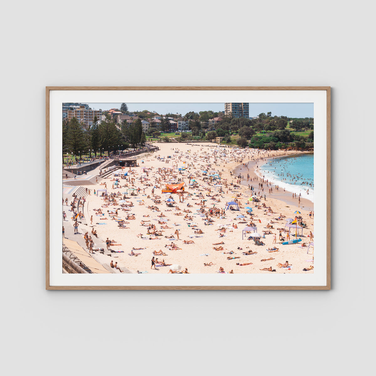 Coogee Beach – Summer in Motion Aerial Print - Traditional Frame - Raw Oak - Landscape